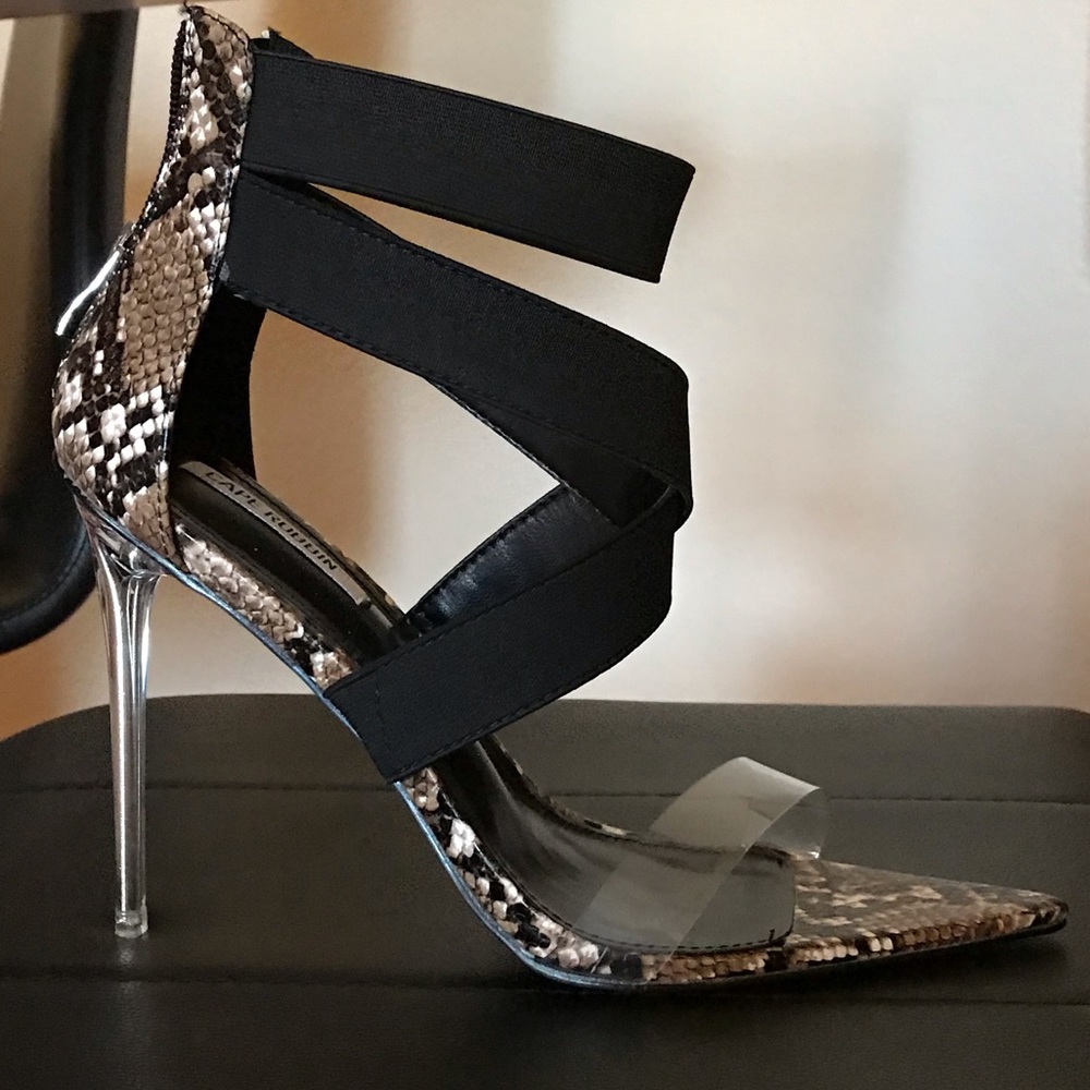 Clear & snakeskin print strappy heels.